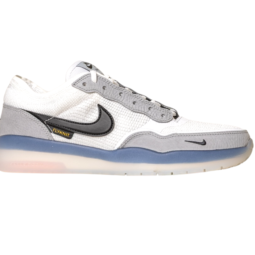 The FV8493-004 Grey White PS8 Nike SB Leather Knit Shoes are shown in side profile, featuring a black Swoosh, mesh-textured upper, Air Zoom cushioning, translucent blue-tinted sole, and Flyknit label on a white background.