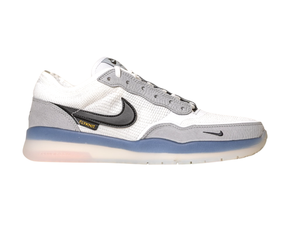 The FV8493-004 Grey White PS8 Nike SB Leather Knit Shoes are shown in side profile, featuring a black Swoosh, mesh-textured upper, Air Zoom cushioning, translucent blue-tinted sole, and Flyknit label on a white background.