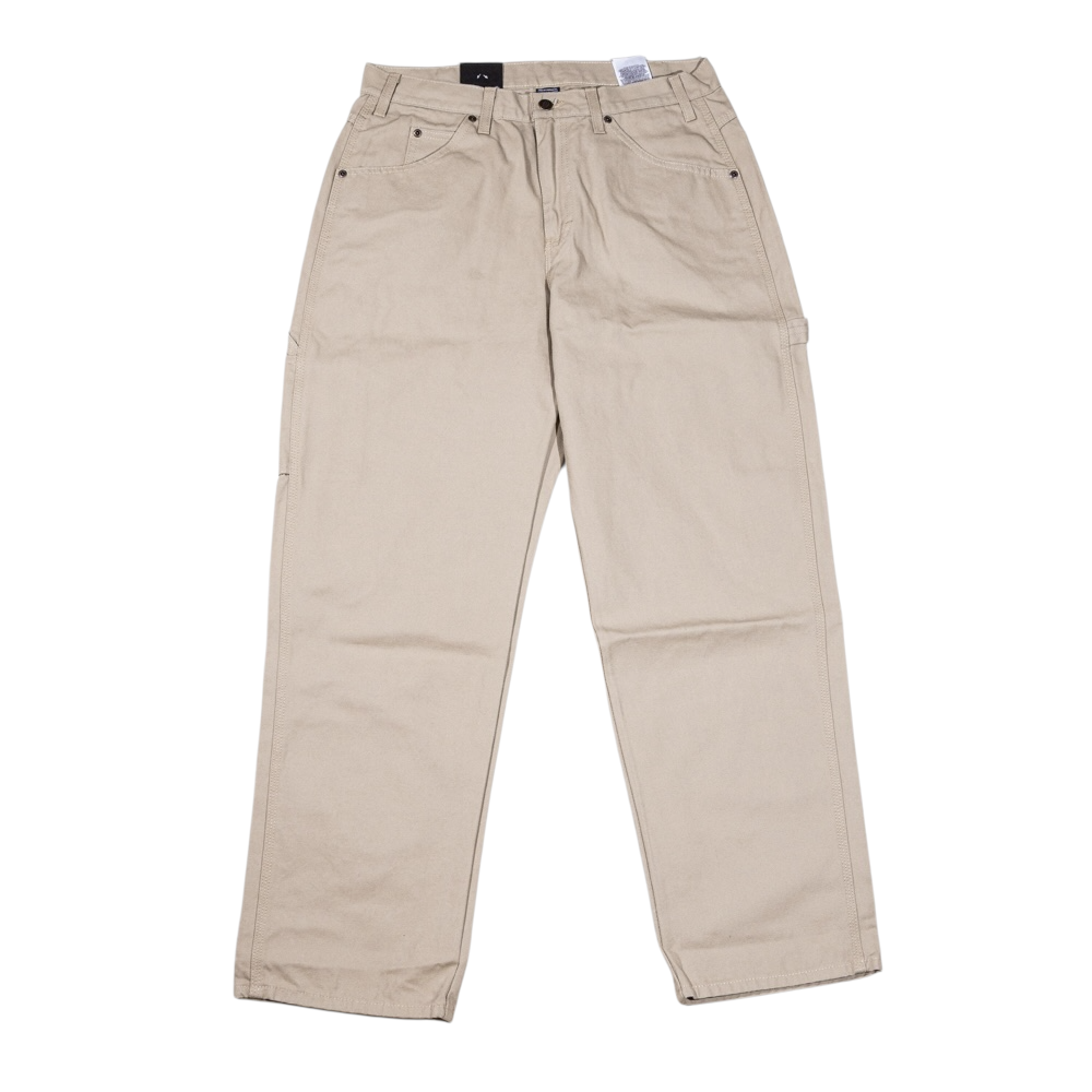 The 1939 Rinsed Desert Sand Duck Relaxed Utility Jean Denim Pant from Dickies Skateboarding features a beige relaxed fit with belt loops, side and back pockets—ideal for versatile men’s workwear. Shown flat on a white background.