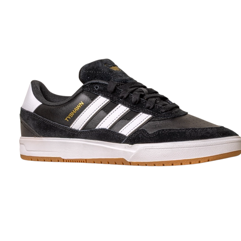 The JI 0846 Black White Gum Tyshawn 2 II Adidas Skateboarding Leather Suede Shoe features black and white colors, white stripes, gold “PSHANAWN” text, black laces, and a light brown gum sole, shown on a white background.