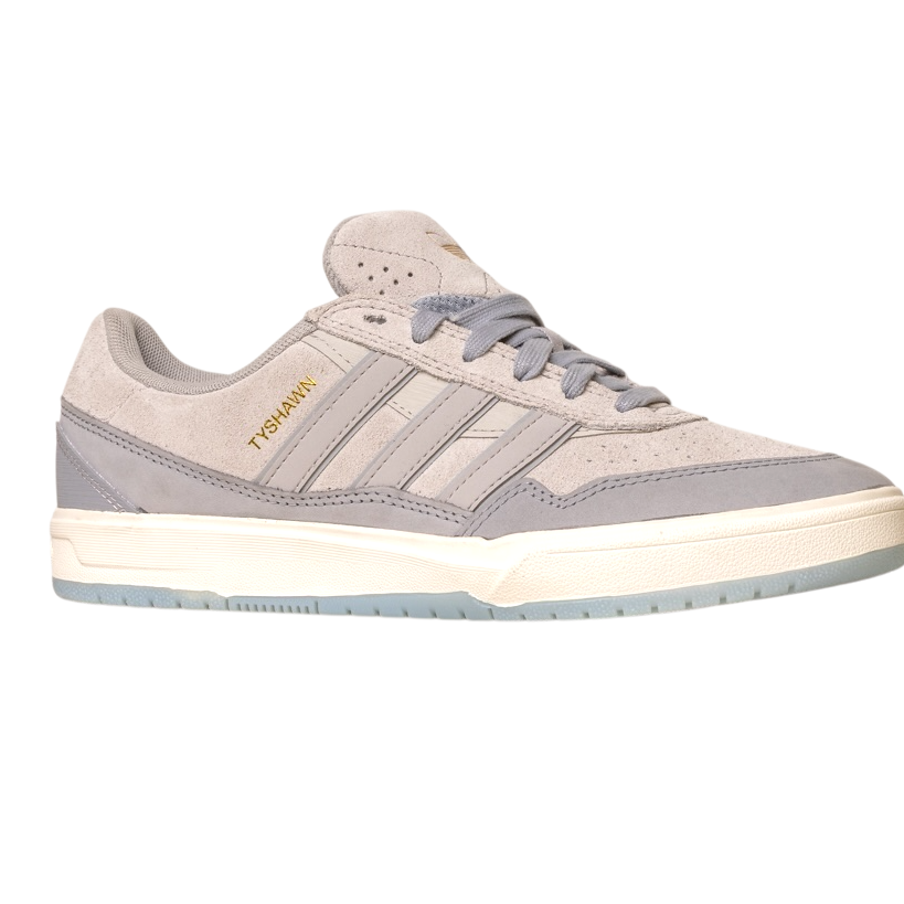 The JI0848 Granite White Tyshawn 2 II Adidas Skateboarding Shoes feature light gray suede and leather, three side stripes, gold THE VELVET text, and a white sole with a light blue bottom, shown on a white background.