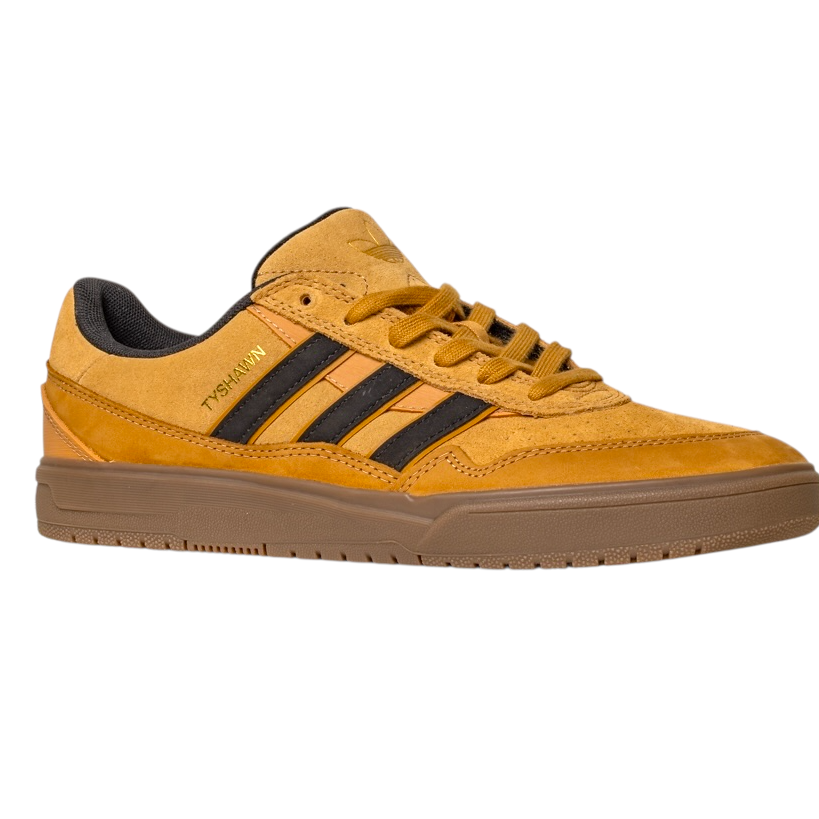 The JI0851 Mesa Black Gum Tyshawn 2 Adidas skateboarding shoes feature a tan and brown leather-suede upper, black stripes, gold TYSHWN text, cushioned collar, cupsole construction, and gum sole on a white background.
