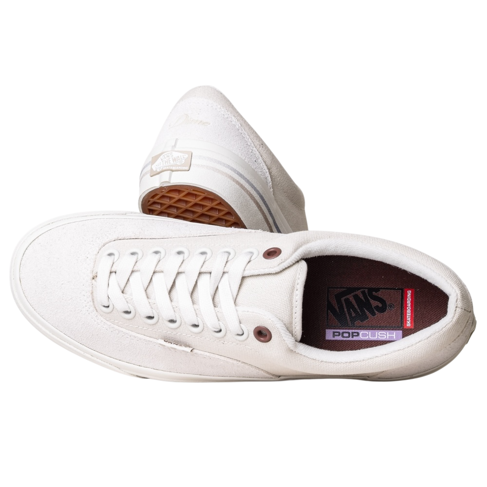 A pair of VN000DA3TUP1 Dime Skate Era Stub Taupe Vans Suede Skateboarding Shoes with white laces and gum soles—one displays the insole Vans logo on its side, while the other stands upright showing the branded heel and outsole tread.