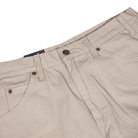 The 1939 Rinsed Desert Sand Duck Relaxed Utility Jean Denim Pant by Dickies Skateboarding features front pockets, belt loops, and a button closure. These relaxed fit carpenter pants offer classic style and durability, perfect for men’s workwear.