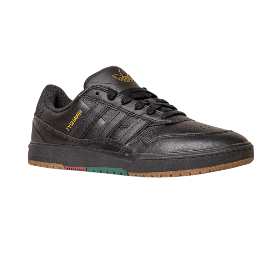 The Tyshawn 2 II Adidas Skateboarding Core Black Core Green Leather Shoes feature black laces, gold branding, a gum-colored sole with green and red accents, and perforated detailing on the toe and side stripes.