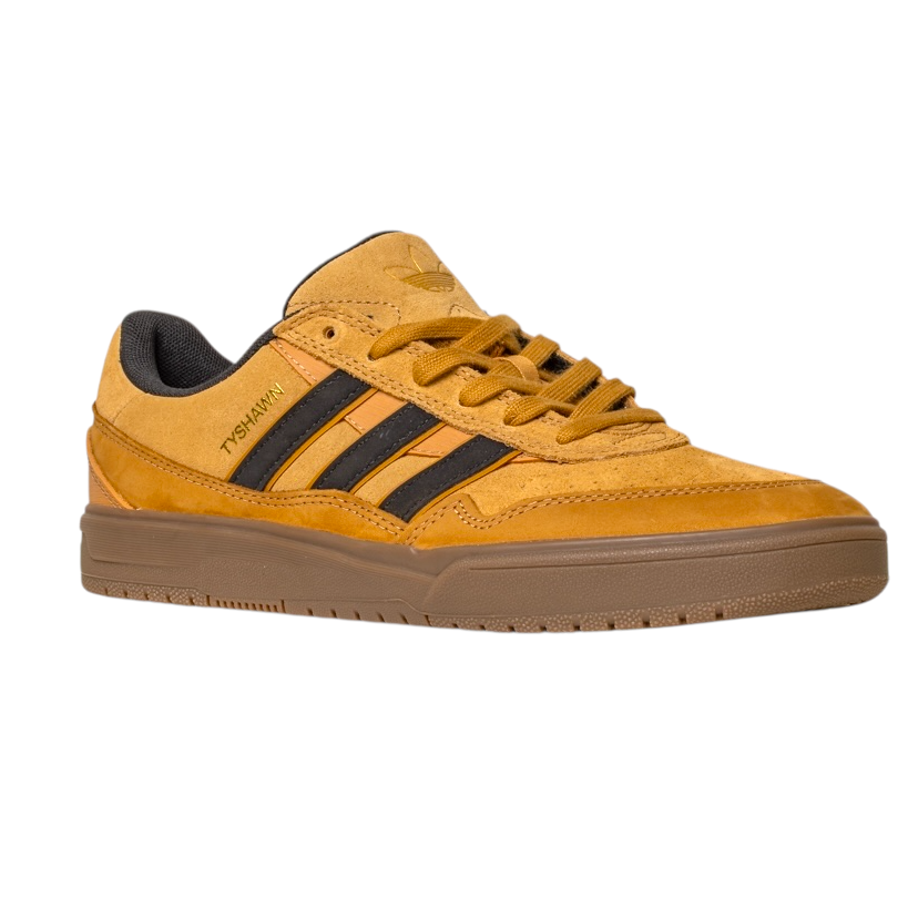 The JI0851 Mesa Black Gum Tyshawn 2 Adidas leather suede skateboarding shoe features black stripes, durable cupsole construction, a gum sole, and TYSHAWN in gold on the side, shown on a white background.