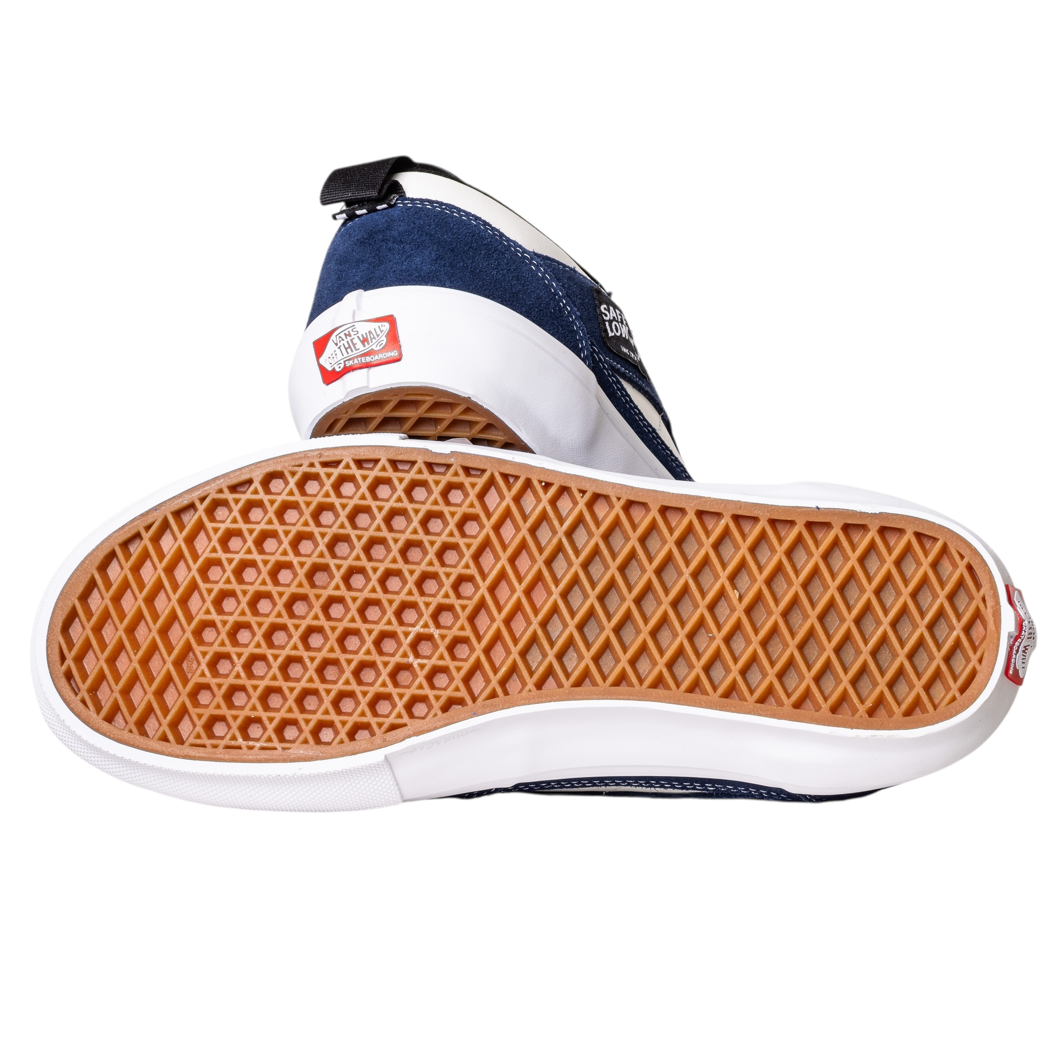 A pair of VN000EEHFRP Skate Safe Low Navy Marshmallow Vans Skate Suede Rubber Shoes, featuring blue and white colors—one shoe on its side displays the signature waffle-patterned gum sole and heel logo for durability and style.