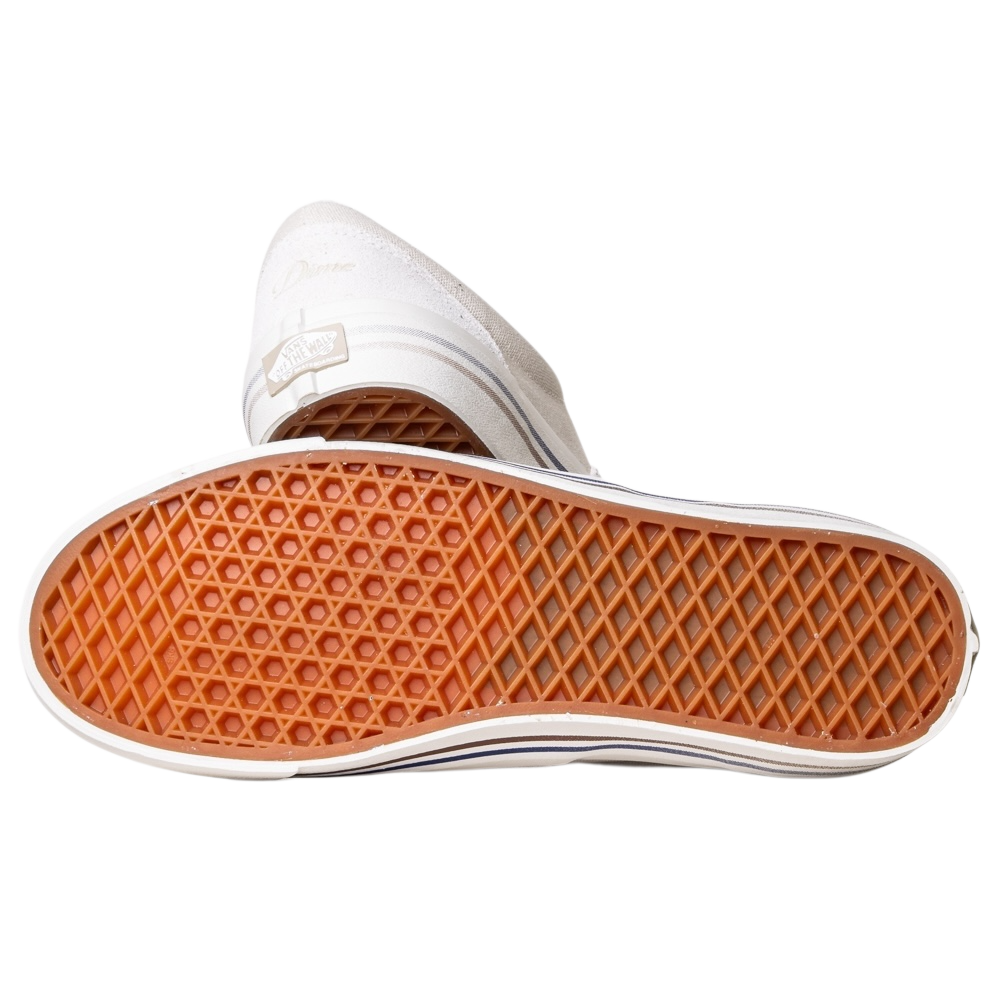 A pair of VN000DA3TUP1 Dime Skate Era Stub Taupe Vans Suede Skateboarding Shoes: one shoe displays the tan waffle-patterned sole, the other stands upright showing the back heel and Vans logo. Plain white background.