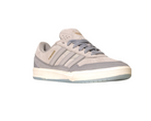 The JI0848 Granite White Tyshawn 2 II Adidas Skateboarding Shoe features gray leather and suede, a white sole, light blue outsole, and gold HANDBALL text on the side, shown against a plain white background.