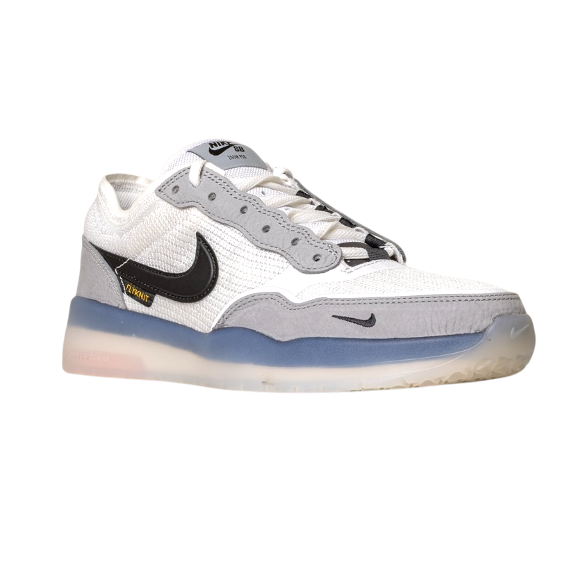 The FV8493004 Grey White PS8 Nike SB Leather Knit Shoes feature a white and gray design, black swoosh, mesh and gray suede accents, translucent sole, and Air Zoom cushioning, shown on a white background.