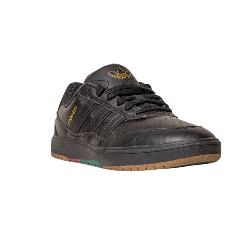 The Tyshawn 2 II Adidas Skateboarding Shoes in Core Black/Core Green feature premium leather, gold branding, a gum sole, and multicolored outsole details, shown angled on a white background.