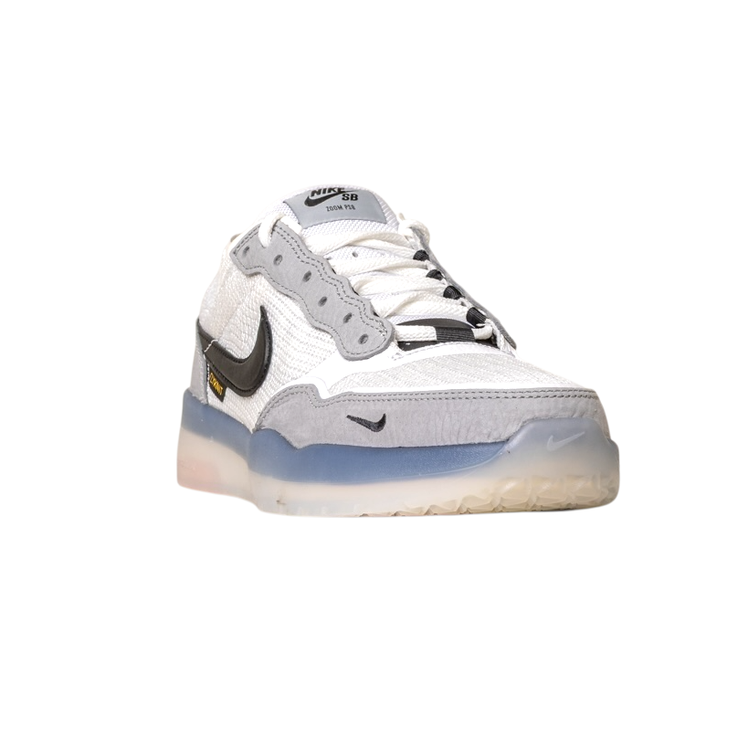 The FV8493-004 Grey White PS8 Nike SB Leather Knit Shoes feature a black Swoosh, translucent sole, and Air Zoom cushioning, shown from the front on a plain white background.