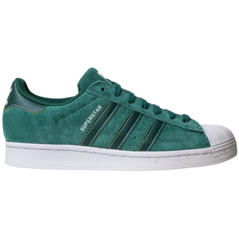 The JQ1103 Core Green White Superstar ADV Adidas Skateboarding Suede Shoes feature a green suede upper, white shell toe and sole, dark green signature three stripes, and “SUPERSTAR” printed in white on the side.