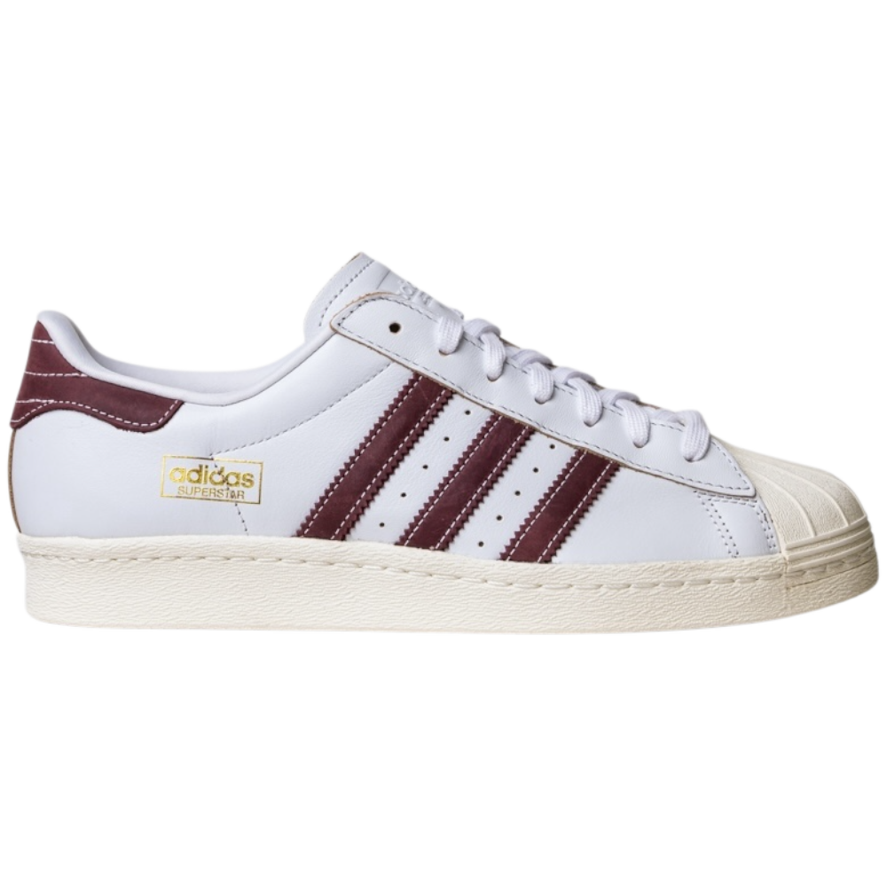 The JP8529 Cloud White Share Superstar 80 ADV Adidas Skateboarding Leather Shoes feature a white leather upper, maroon stripes and heel tab, gold Superstar branding, and an off-white shell toe and sole, shown from the side on a white background.