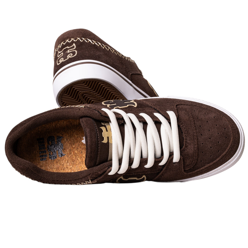 A pair of Kenny Reed Low Vulc Brown Suede I Path skateboarding shoes, with white laces and stitching, cork insole, and beige embroidery on the tongue and heel, shown from top and side views.