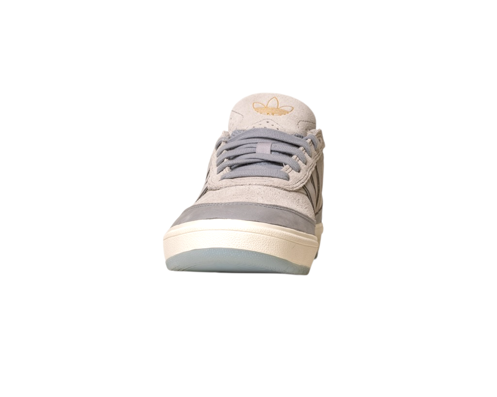 A front view of the JI0848 Granite White Tyshawn 2 II Adidas Skateboarding shoe in grey with a beige sole on a white background. The Adidas logo appears on the tongue, showcasing its classic leather and suede skateboarding design.
