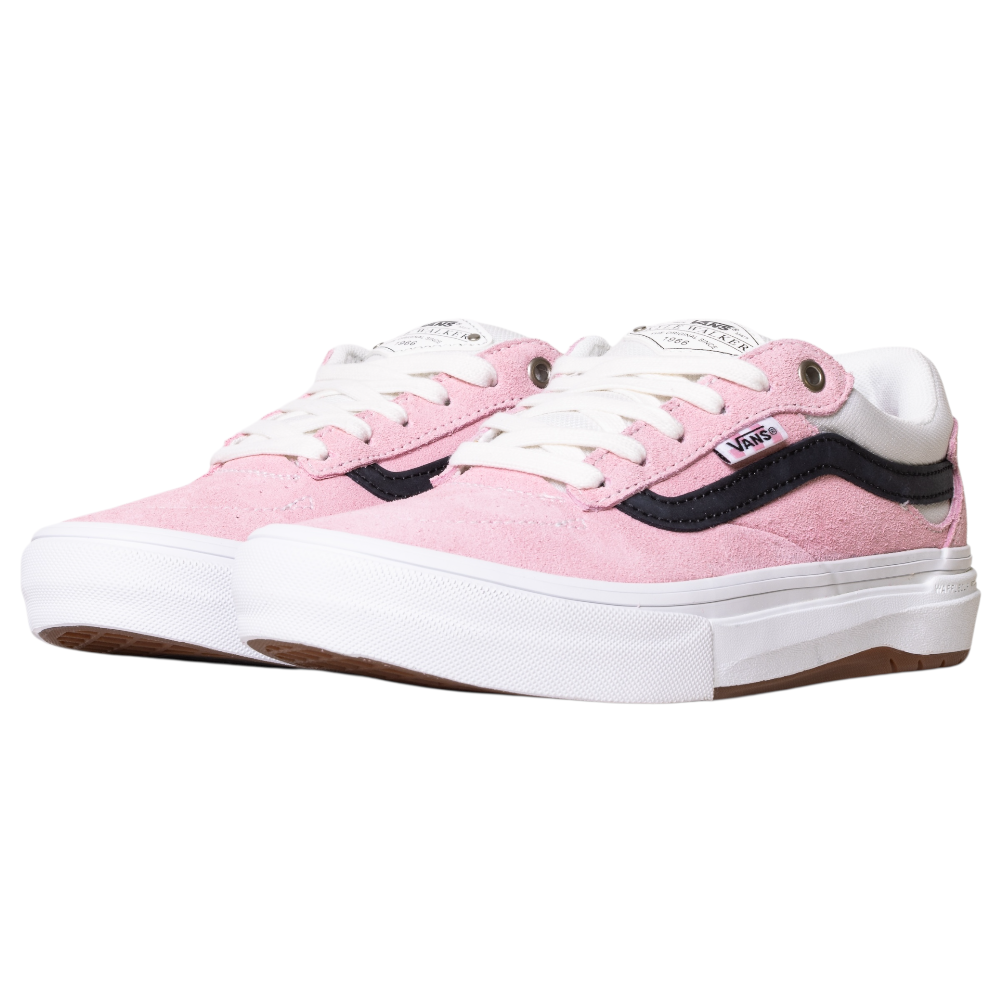 A pair of VN000DA4PNK1 Skate Kyle Walker Wafflecup Pink Vans Suede Rubber Shoes with white laces, thick white soles, and a black side stripe are positioned side by side on a white background.