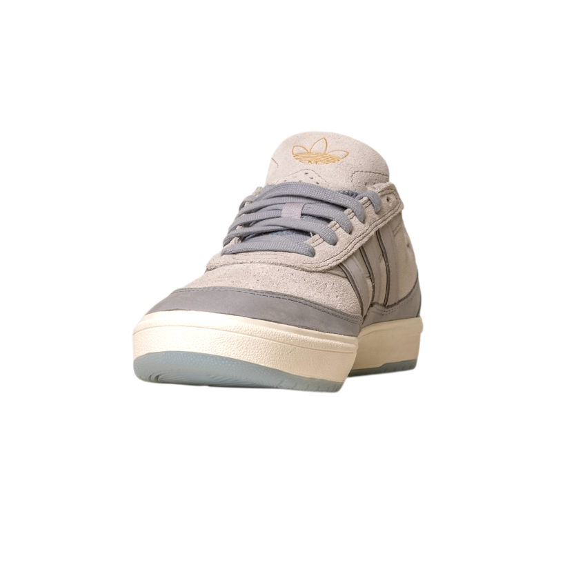 The JI0848 Granite White Tyshawn 2 II Adidas Skateboarding Shoes feature light gray and beige leather and suede, gray laces, and a gold logo on the tongue, shown from the front on a white background.