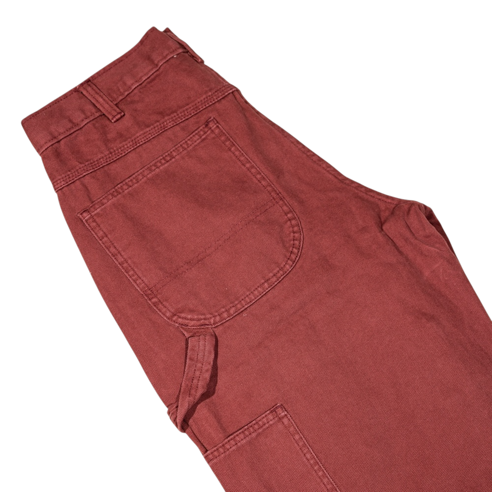 A close-up of the A87PE Burgundy Andorra Double Knee Canvas Carpenter Pant Dickies Skateboarding showcases the waistband, belt loop, large side pocket, and stitching details against a white background.