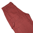 A close-up of the A87PE Burgundy Andorra Double Knee Canvas Carpenter Pant Dickies Skateboarding showcases the waistband, belt loop, large side pocket, and stitching details against a white background.
