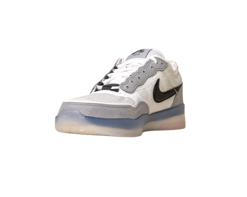 The FV8493-004 Grey White PS8 Nike SB Leather Knit Shoes feature a white and gray low-top design, black swoosh, mesh and leather details, Air Zoom cushioning, and a translucent blue-tinted rubber sole. Shown on a white background.