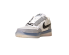 The FV8493-004 Grey White PS8 Nike SB Leather Knit Shoes feature a white and gray low-top design, black swoosh, mesh and leather details, Air Zoom cushioning, and a translucent blue-tinted rubber sole. Shown on a white background.