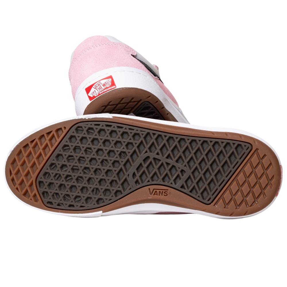 The VN000DA4PNK1 Skate Kyle Walker Wafflecup Pink Vans feature pink and white suede uppers, a red Vans heel logo, and a textured brown-black rubber sole with the Vans logo—ideal for skateboarding.