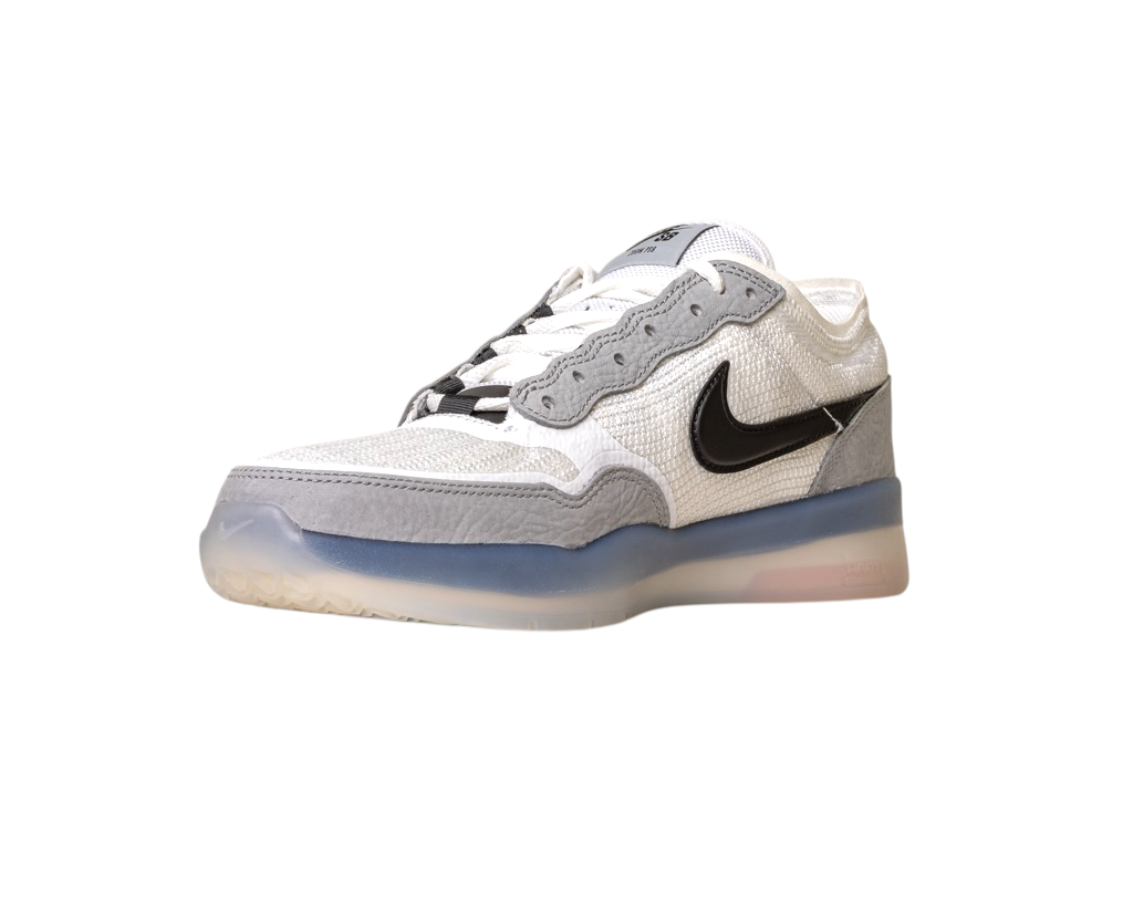 The FV8493004 Grey White PS8 Nike SB Leather Knit Shoes feature a white and gray low-top design, black Nike swoosh, mesh and suede textures, Air Zoom cushioning, and a translucent blue-tinted sole.