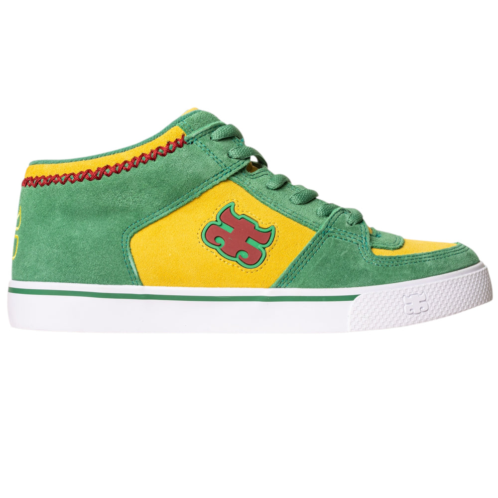 The Kenny Reed Mid Vulc Green Yellow Suede I Path Shoes feature green and yellow suede, a white sole, red puzzle piece logo on the side, red ankle stitching, and green laces—perfect for skateboarding in classic Kenny Reed style.
