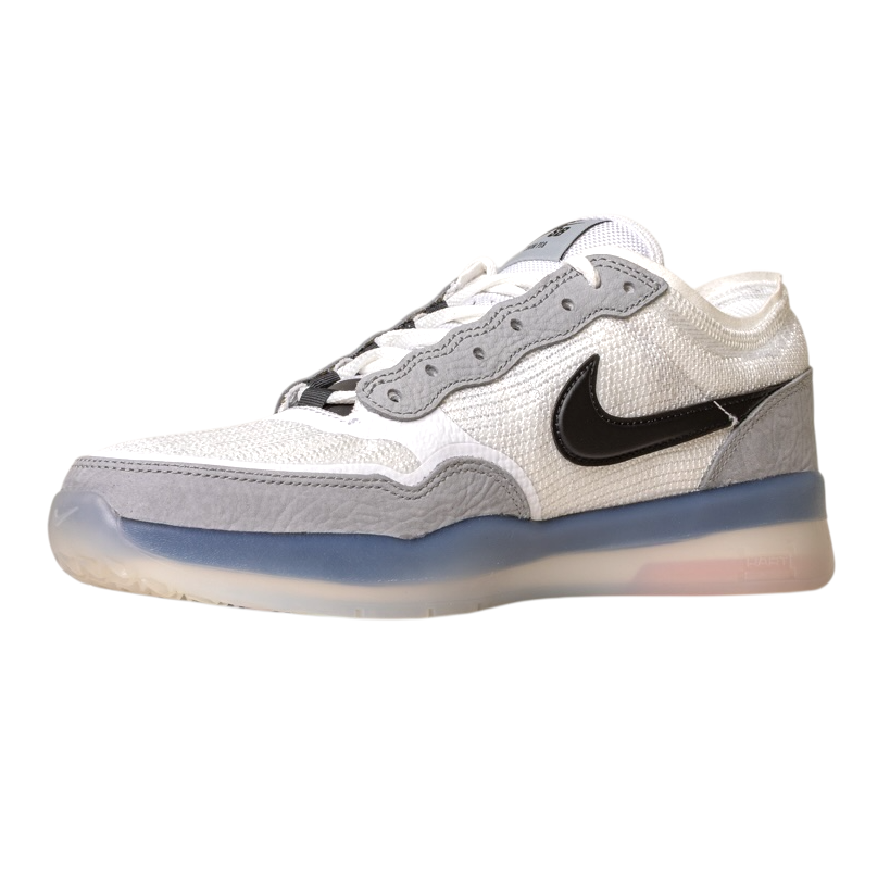 The FV8493-004 Grey White PS8 Nike SB Leather Knit Shoes feature a white and light gray design, black Nike swoosh and lace accents, a translucent blue-tinted sole, and Air Zoom cushioning, shown on a white background.