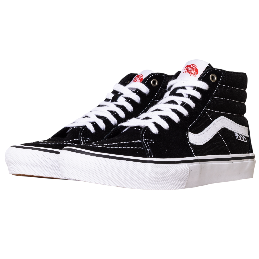 The VN0A5FCCY281 Black White Skate SK8-HI Suede Vans Shoes feature a black suede high-top design, white laces, classic side stripes, white rubber soles, a red logo on the tongue, and visible white stitching.