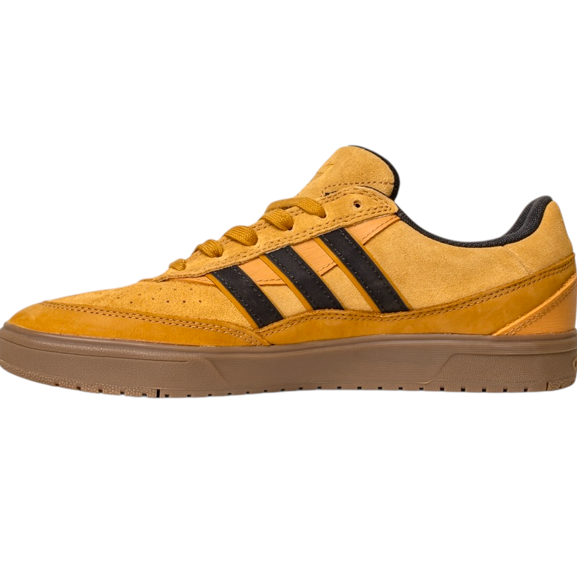The JI0851 Mesa Black Gum Tyshawn 2 Adidas skateboarding shoe features mustard yellow leather and suede, black stripes, a brown gum sole, and signature cupsole construction inspired by the Tyshawn II.