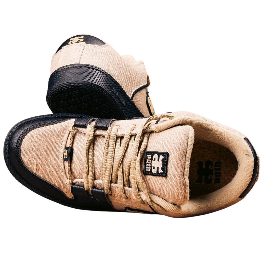 The Cricket Natural Hemp I Path Shoes Skateboarding, shown on a white background, feature a beige and black design, thick cupsole construction, visible laces, and a logo on the tongue.