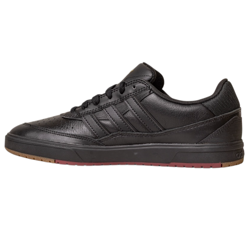 The Tyshawn 2 II Adidas Skateboarding Core Black/Core Green Leather Shoes feature black leather, black laces, a textured sole, and subtle stitching, viewed from the side on a white background.