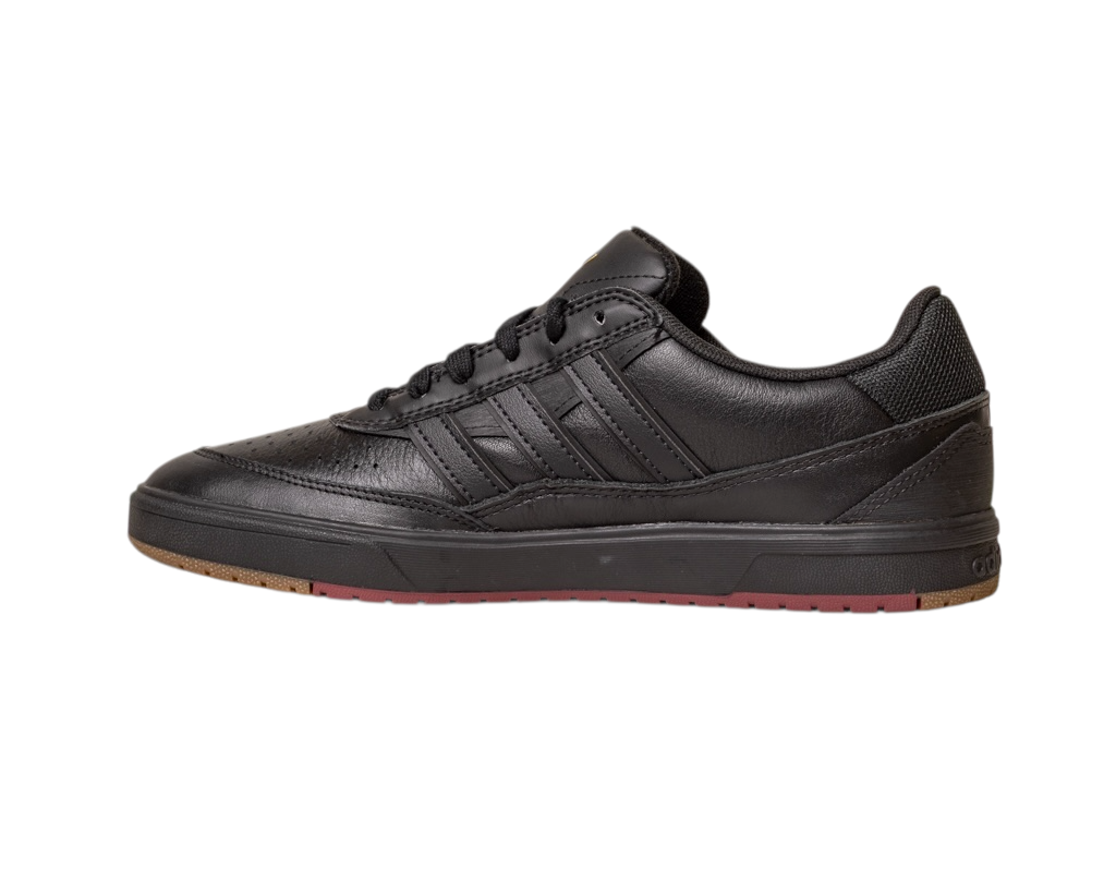 The Tyshawn 2 II Adidas Skateboarding Core Black/Core Green Leather Shoes feature black leather, black laces, a textured sole, and subtle stitching, viewed from the side on a white background.