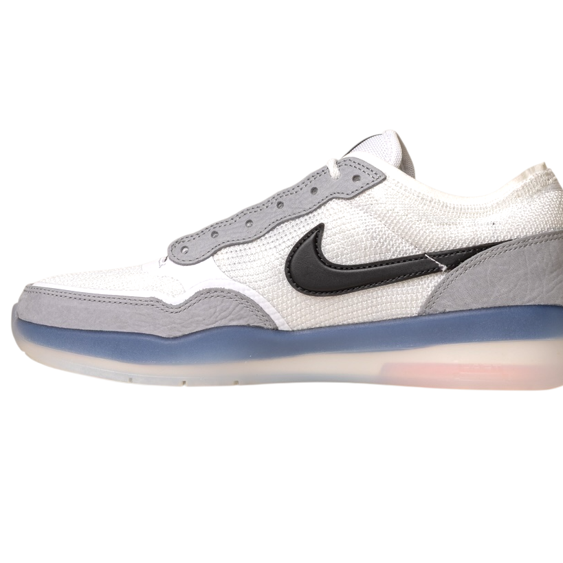 The FV8493-004 Grey White PS8 Nike SB Leather Knit Shoes feature a white and gray design with a black swoosh, mesh upper, light gray suede overlays, Air Zoom cushioning, and a translucent sole, displayed from the side on a white background.