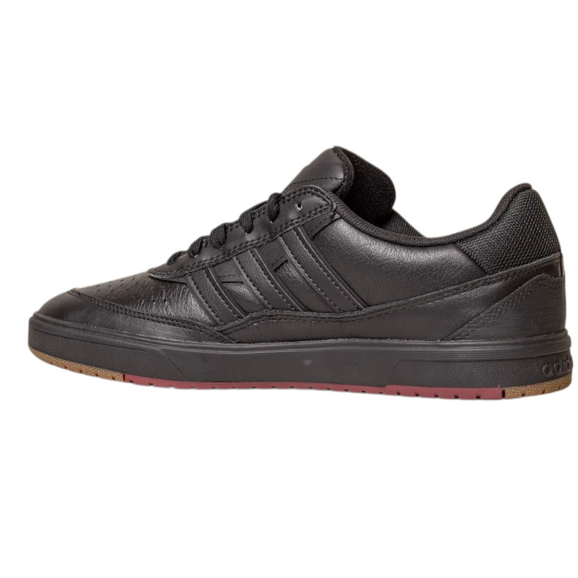 The Tyshawn 2 II Adidas Skateboarding Core Black/Core Green Leather Shoes feature a low profile, textured sole, and three side stripes, shown here against a white background.