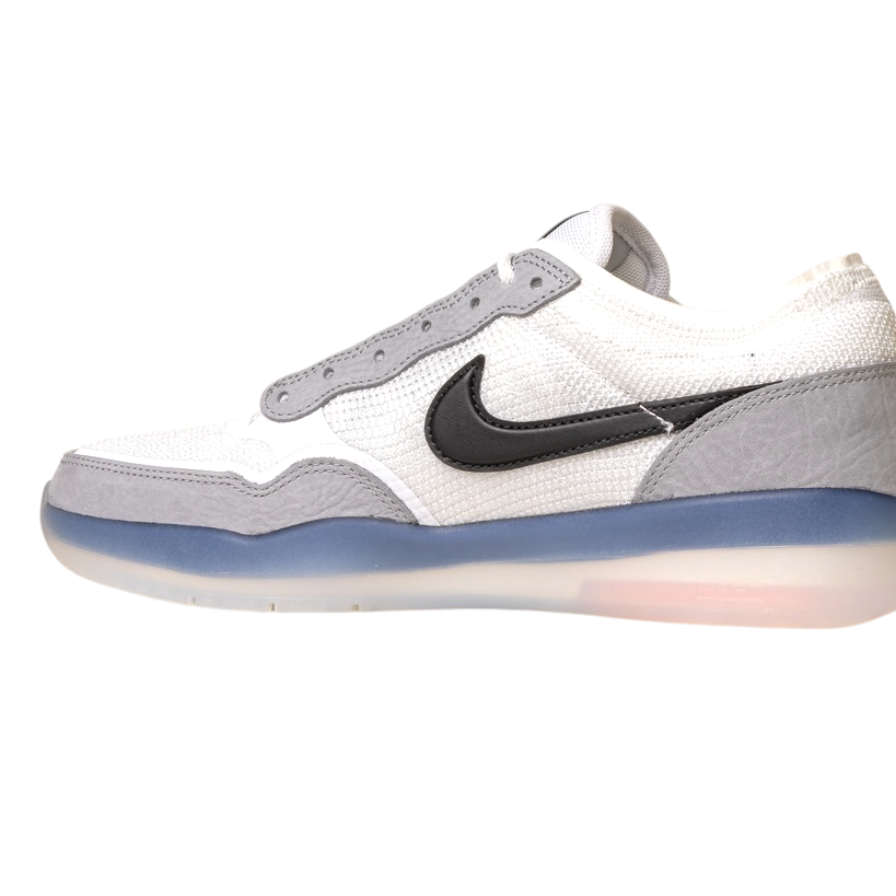 The FV8493-004 Grey White PS8 Nike SB Leather Knit Shoes feature white uppers with grey and light blue accents, a black Nike swoosh, Air Zoom cushioning, and a translucent sole, shown on a white background.