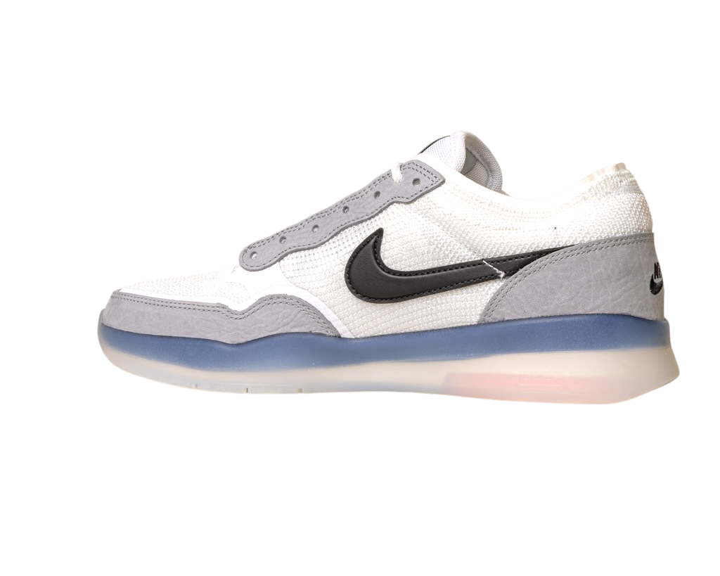 The FV8493-004 Grey White PS8 Nike SB Leather Knit Shoes feature white uppers with grey and light blue accents, a black Nike swoosh, Air Zoom cushioning, and a translucent sole, shown on a white background.