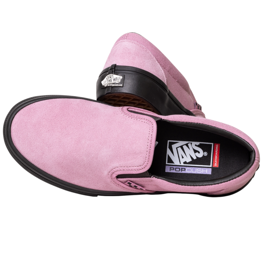 The VN0A5FCAPIB1 Pink Black Skate Slip On Vans Suede Shoes feature pink suede uppers, black rubber soles, and visible Vans logos on the insole and heel—combining standout style with reliable board control.