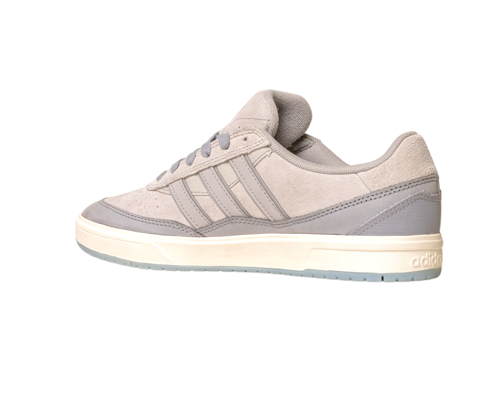 The JI0848 Granite White Tyshawn 2 Adidas Skateboarding Shoes feature light gray leather and suede, signature three stripes, a cream midsole, and light gray outsole, inspired by the iconic Tyshawn II design.