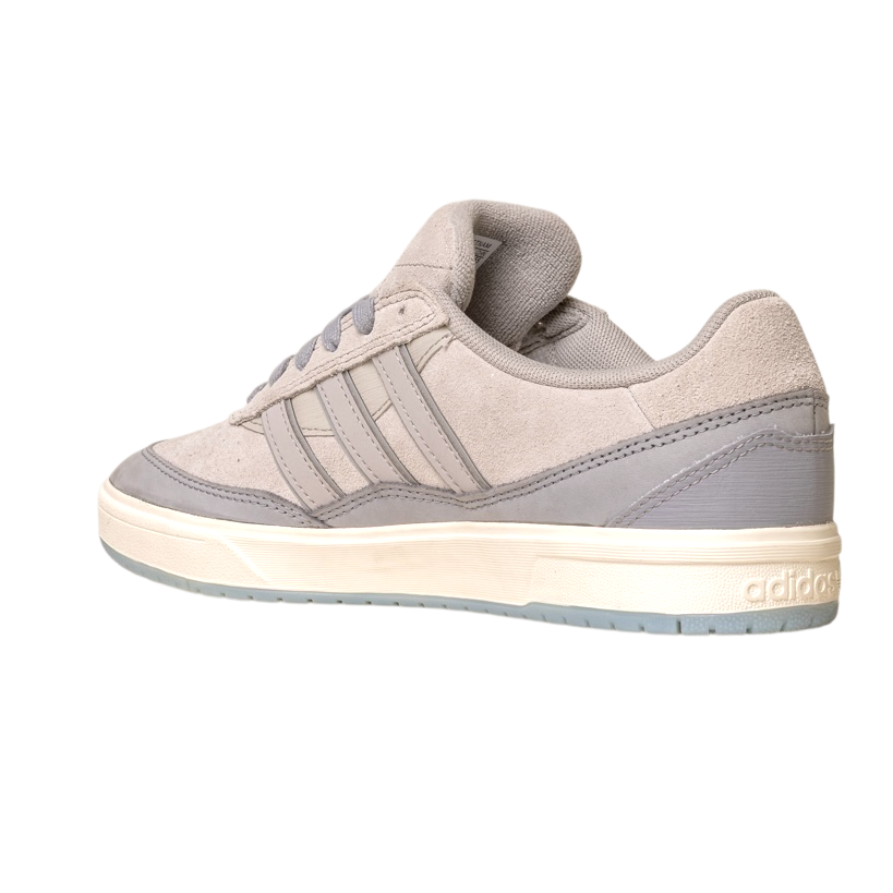 The JI0848 Granite White Tyshawn 2 Adidas Skateboarding Shoe features a light gray suede and leather upper, signature three side stripes, beige midsole, and gray outsole, shown angled to display the outer side and heel on a white background.