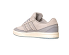 The JI0848 Granite White Tyshawn 2 Adidas Skateboarding Shoe features a light gray suede and leather upper, signature three side stripes, beige midsole, and gray outsole, shown angled to display the outer side and heel on a white background.