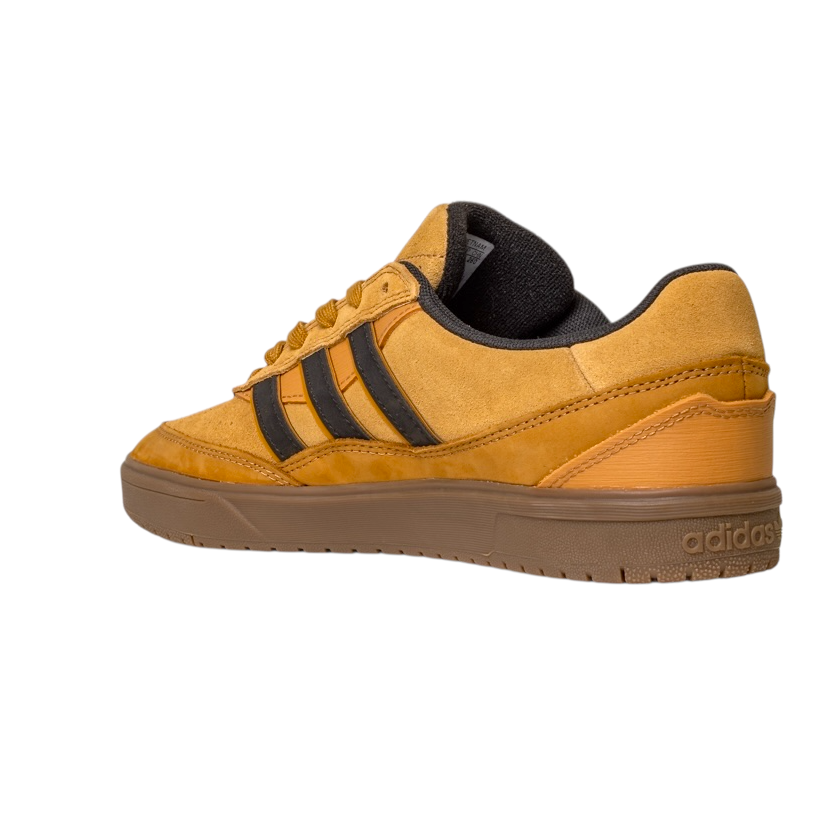 The JI0851 Mesa Black Gum Tyshawn II Adidas Leather Suede Skateboarding Shoe features a mustard yellow upper with black stripes, brown accents, and a tan cupsole, shown from the side on a white background.