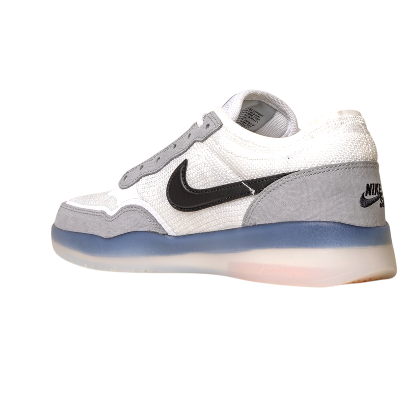 The FV8493-004 Grey White PS8 Nike SB Leather Knit Shoes feature a black swoosh logo, translucent blue sole, and advanced Air Zoom cushioning, shown on a plain white background.