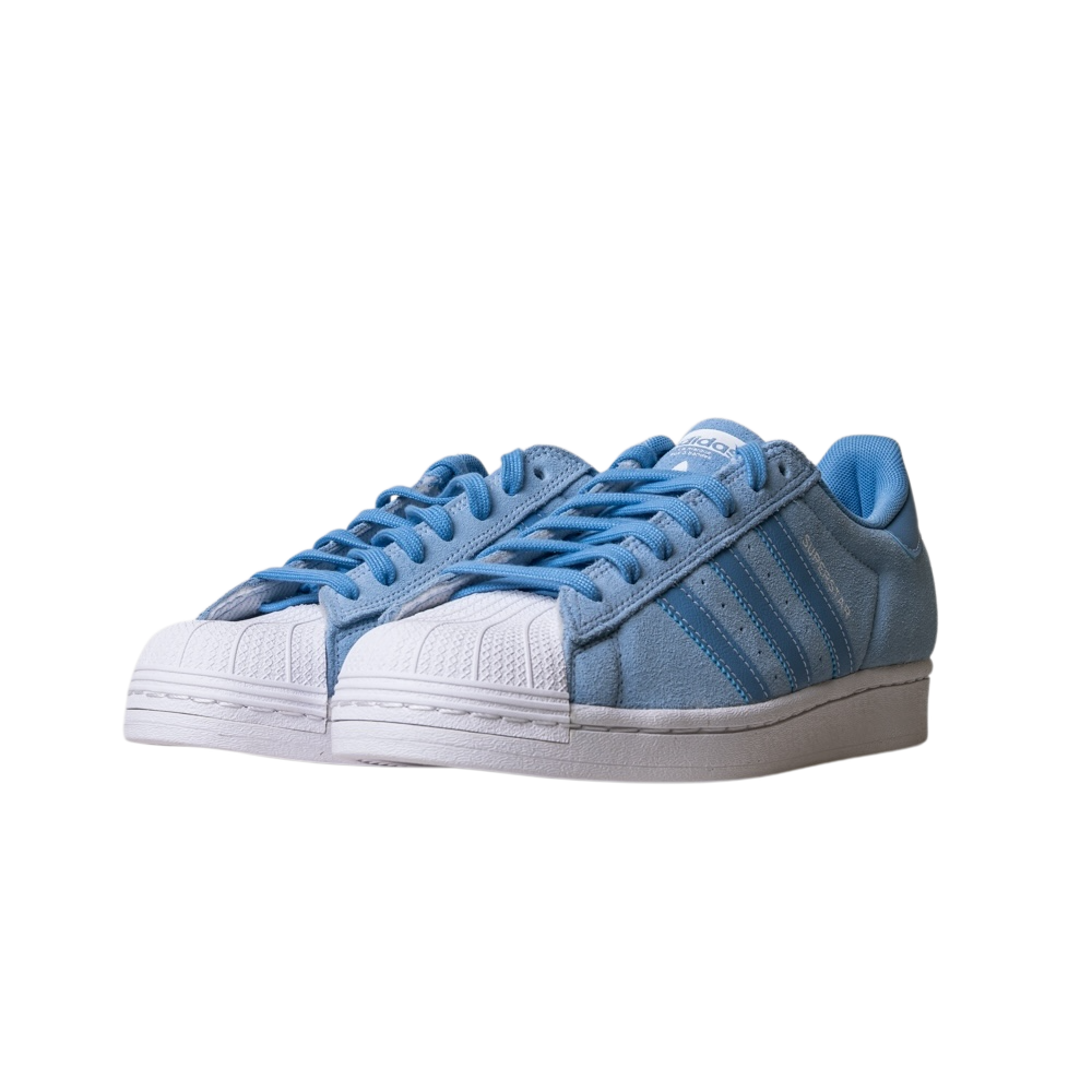 The JQ1102 Light Blue White Superstar ADV Adidas Skateboarding Suede Shoes feature white rubber shell toes, white soles, and blue laces, displayed on a plain white background.