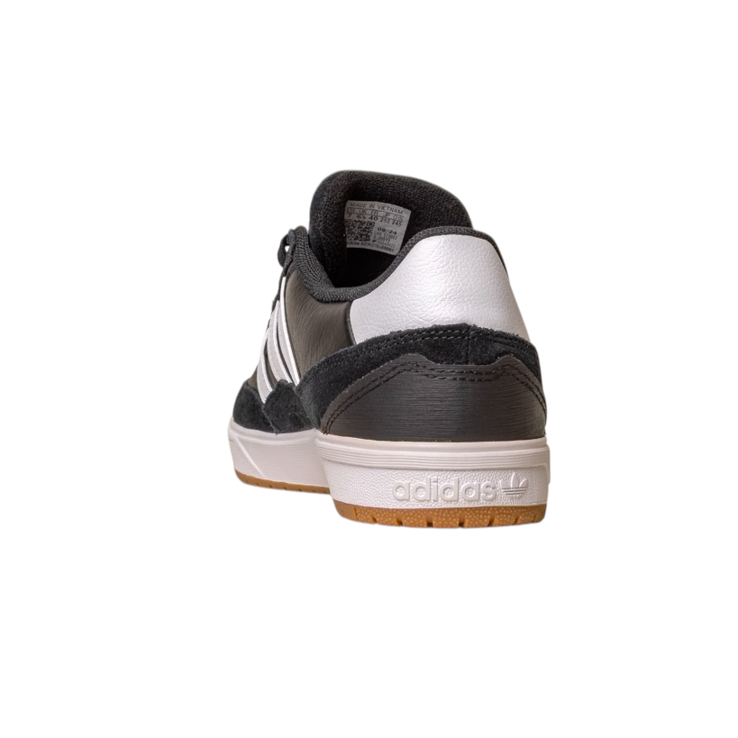 The JI 0846 Black White Gum Tyshawn II Adidas Skateboarding Shoes are shown from the back on a white background, featuring leather suede accents, gray stripes, and a gum-colored sole with the Adidas logo.