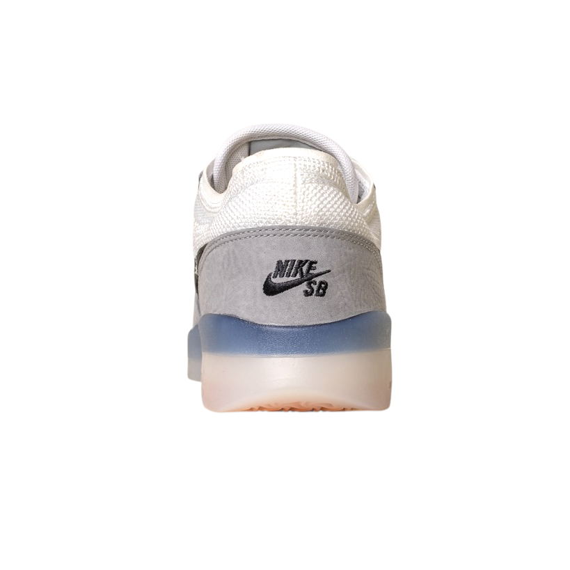 Rear view of FV8493004 Grey White PS8 Nike SB Leather Knit Shoes with a white upper, grey heel, black NIKE SB logo, translucent blue sole detail, and durable HART outsole on a plain white background.