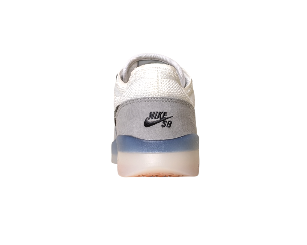 Rear view of FV8493004 Grey White PS8 Nike SB Leather Knit Shoes with a white upper, grey heel, black NIKE SB logo, translucent blue sole detail, and durable HART outsole on a plain white background.