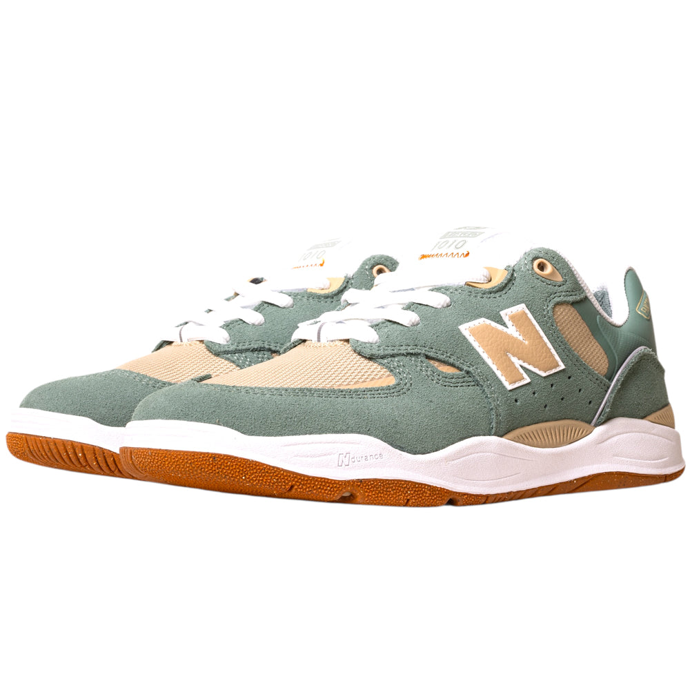 The 1010TC Dark Juniper Sandstone Tiago Lemos New Balance Numeric Suede Skateboarding Shoes feature sage green suede, beige mesh, white laces, gum rubber soles, and a white and tan N logo on the sides.